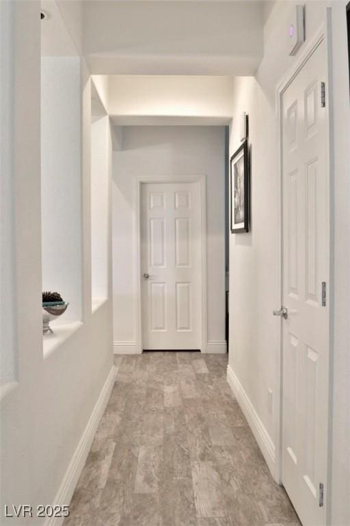 11240 Romette Ct, Las Vegas, NV 89141 - corridor featuring baseboards