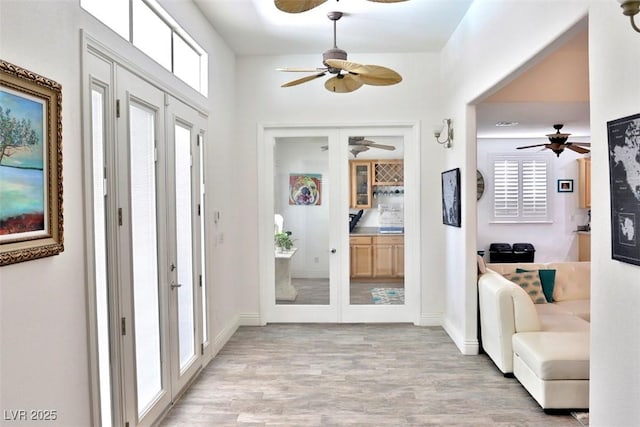 11240 Romette Ct, Las Vegas, NV 89141 - entryway featuring french doors, light wood-type flooring, and a ceiling fan