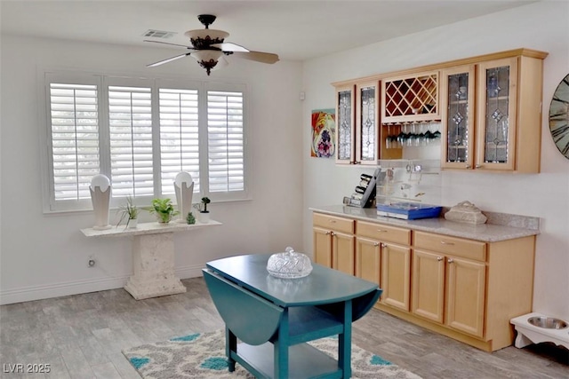 11240 Romette Ct, Las Vegas, NV 89141 - bar area featuring ceiling fan and light wood-type flooring