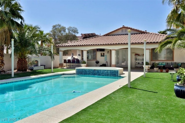 11240 Romette Ct, Las Vegas, NV 89141 - back of property with stucco siding, a tiled roof, and an outdoor hangout area
