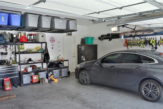 11240 Romette Ct, Las Vegas, NV 89141 - garage with freestanding refrigerator