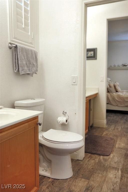 11240 Romette Ct, Las Vegas, NV 89141 - ensuite bathroom with vanity and wood finished floors