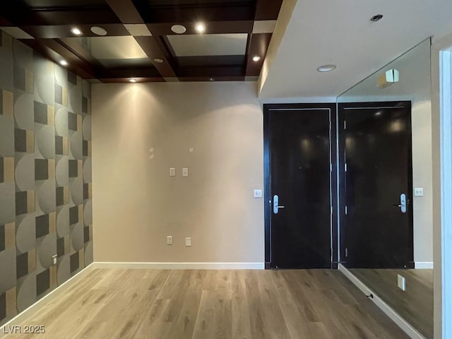 4575 Dean Martin Dr Unit 705, Las Vegas, NV 89103 - foyer with wood finished floors, coffered ceiling, beam ceiling, and recessed lighting