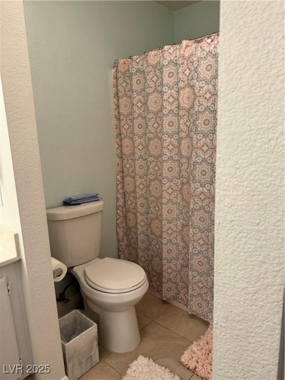 4831 S Torrey Pines Dr Unit 204, Las Vegas, NV 89103 - bathroom featuring vanity, tile patterned floors, and curtained shower