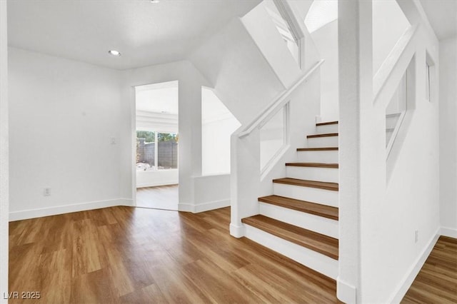 9824 Babys Breath Ct, Las Vegas, NV 89183 - stairway with wood finished floors and recessed lighting