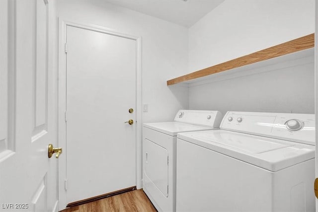 9824 Babys Breath Ct, Las Vegas, NV 89183 - laundry area featuring washing machine and dryer and light wood-style floors