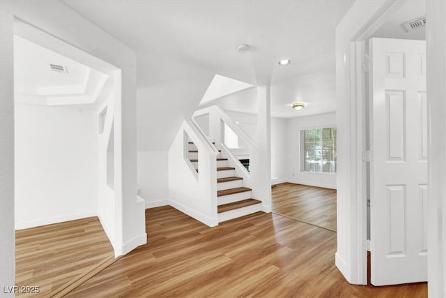 9824 Babys Breath Ct, Las Vegas, NV 89183 - staircase featuring wood finished floors and recessed lighting