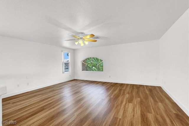 9824 Babys Breath Ct, Las Vegas, NV 89183 - empty room with wood finished floors and a ceiling fan