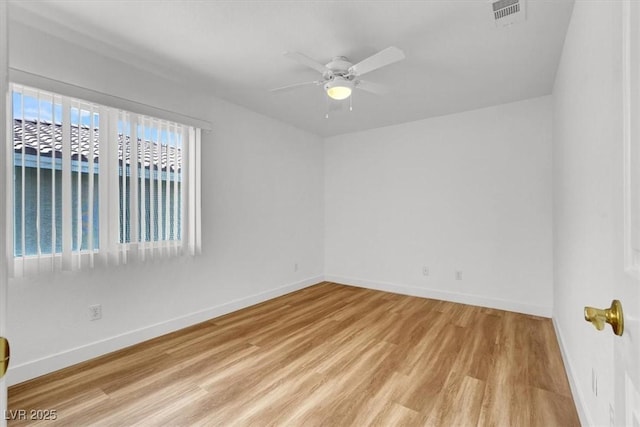 9824 Babys Breath Ct, Las Vegas, NV 89183 - spare room with light wood-style flooring and a ceiling fan