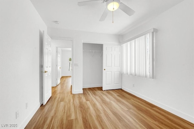 9824 Babys Breath Ct, Las Vegas, NV 89183 - unfurnished bedroom with light wood finished floors, a closet, and a ceiling fan