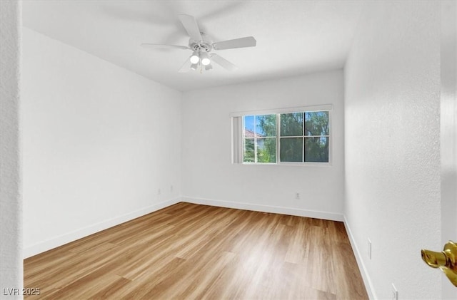 9824 Babys Breath Ct, Las Vegas, NV 89183 - spare room with wood finished floors and ceiling fan