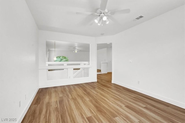 9824 Babys Breath Ct, Las Vegas, NV 89183 - spare room with a ceiling fan and wood finished floors