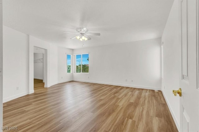 9824 Babys Breath Ct, Las Vegas, NV 89183 - unfurnished room featuring ceiling fan and light wood-type flooring