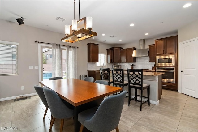 176 Dunblane St, Henderson, NV 89012 - dining room featuring light tile patterned floors and recessed lighting