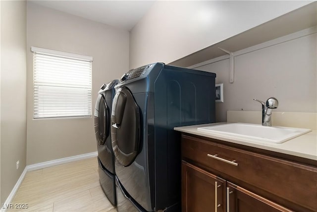 176 Dunblane St, Henderson, NV 89012 - laundry area featuring washer and clothes dryer and cabinet space