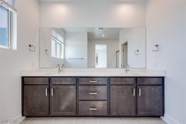860 Echelon St, Las Vegas, NV 89138 - bathroom featuring double vanity and tile patterned flooring