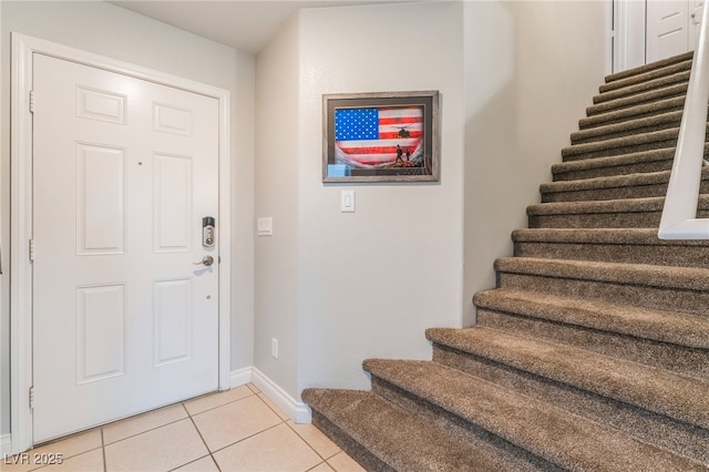 2064 Spiers Ave, Las Vegas, NV 89183 - foyer entrance featuring stairway and light tile patterned floors