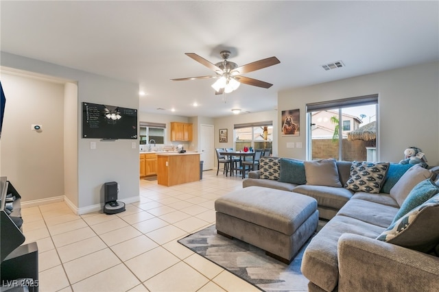 2064 Spiers Ave, Las Vegas, NV 89183 - living room with a ceiling fan and light tile patterned flooring