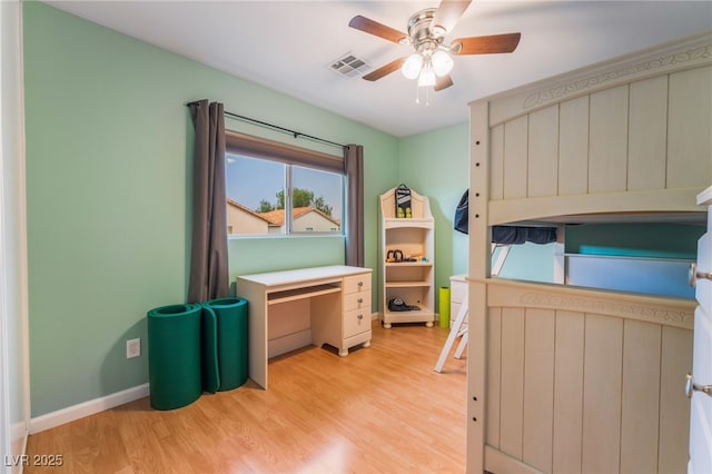 2064 Spiers Ave, Las Vegas, NV 89183 - unfurnished bedroom with light wood-style flooring and ceiling fan