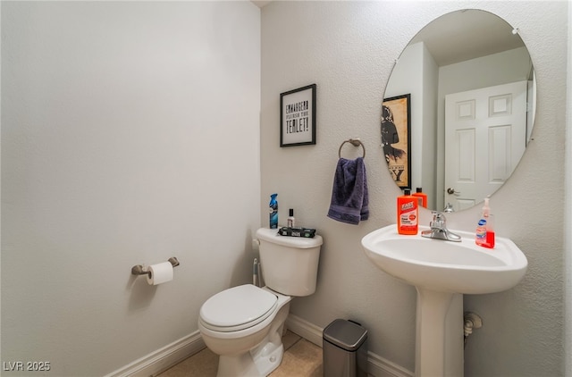 2064 Spiers Ave, Las Vegas, NV 89183 - bathroom with toilet and tile patterned floors