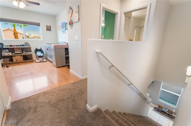2064 Spiers Ave, Las Vegas, NV 89183 - staircase with ceiling fan and carpet floors