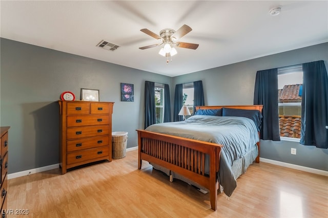 2064 Spiers Ave, Las Vegas, NV 89183 - bedroom featuring light wood-style flooring and ceiling fan