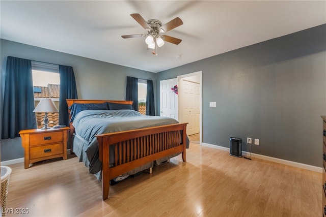 2064 Spiers Ave, Las Vegas, NV 89183 - bedroom with light wood-style flooring and ceiling fan