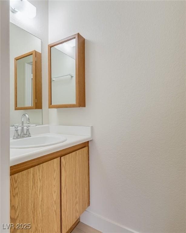 4630 Pratt Way, Las Vegas, NV 89147 - bathroom featuring vanity and baseboards
