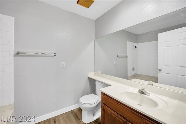 5576 W Rochelle Ave Unit 9C, Las Vegas, NV 89103 - full bathroom with wood finished floors, vanity, and a shower