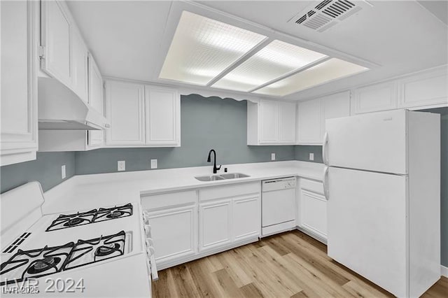 5576 W Rochelle Ave Unit 9C, Las Vegas, NV 89103 - kitchen featuring white appliances, exhaust hood, white cabinets, light wood-type flooring, and light countertops