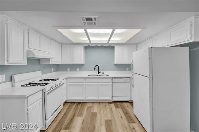 5576 W Rochelle Ave Unit 9C, Las Vegas, NV 89103 - kitchen with white appliances, custom exhaust hood, light wood-type flooring, white cabinets, and light countertops