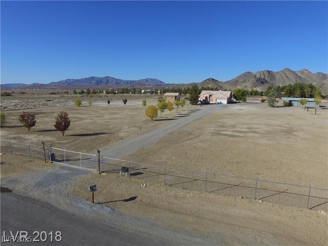 1710 N Murphy St, Pahrump, NV 89060 - view of dirt / gravel road with a mountain view and a rural view
