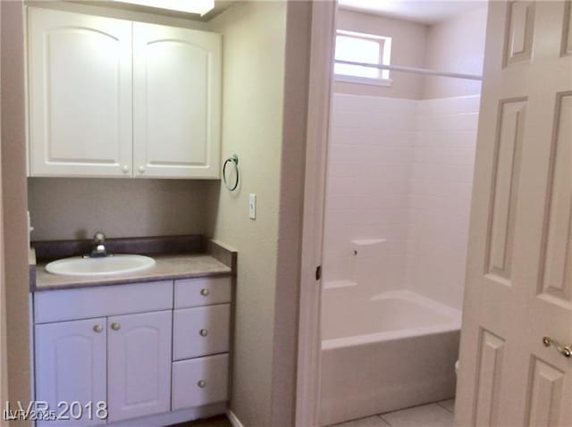 1710 N Murphy St, Pahrump, NV 89060 - full bath featuring vanity, shower / bathtub combination, and tile patterned flooring