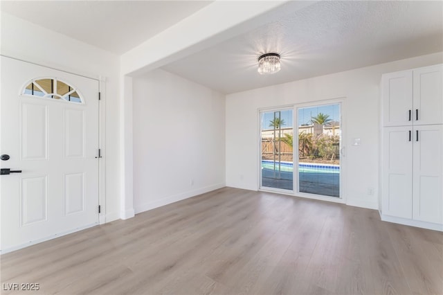 2 Utah Way, Henderson, NV 89015 - entrance foyer featuring light wood-type flooring and baseboards