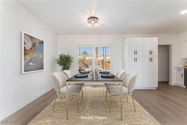 2 Utah Way, Henderson, NV 89015 - dining space featuring light wood-style floors and baseboards