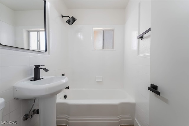 2 Utah Way, Henderson, NV 89015 - bathroom featuring tile walls and bathtub / shower combination