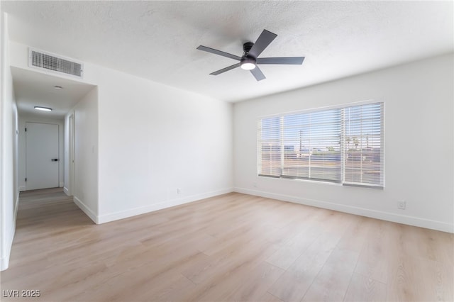 2 Utah Way, Henderson, NV 89015 - spare room with light wood-type flooring, ceiling fan, and a textured ceiling