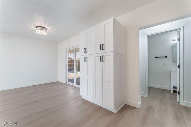 2 Utah Way, Henderson, NV 89015 - hallway featuring light wood-type flooring and baseboards