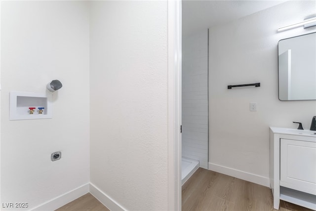 2 Utah Way, Henderson, NV 89015 - laundry room with hookup for a washing machine, light wood-style floors, and electric dryer hookup