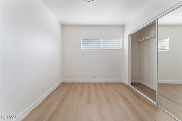2 Utah Way, Henderson, NV 89015 - unfurnished bedroom featuring light wood-style floors and a closet