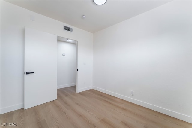 2 Utah Way, Henderson, NV 89015 - spare room featuring light wood-style floors and baseboards