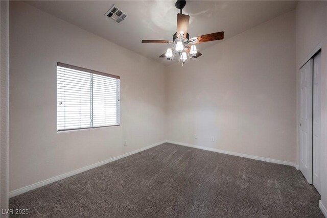 1598 Cowboy Chaps Pl, Henderson, NV 89002 - unfurnished bedroom with carpet, a closet, and a ceiling fan