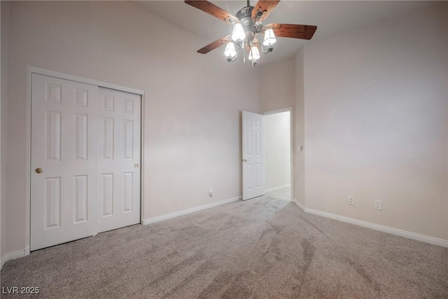 1598 Cowboy Chaps Pl, Henderson, NV 89002 - unfurnished bedroom featuring carpet flooring, high vaulted ceiling, a closet, and a ceiling fan