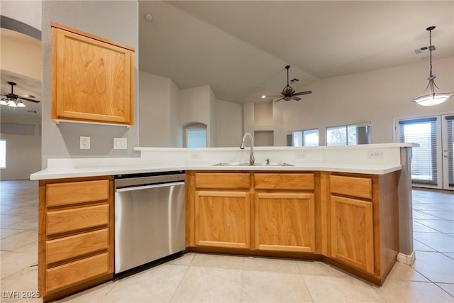1598 Cowboy Chaps Pl, Henderson, NV 89002 - kitchen featuring dishwasher, ceiling fan, a peninsula, light tile patterned floors, and high vaulted ceiling