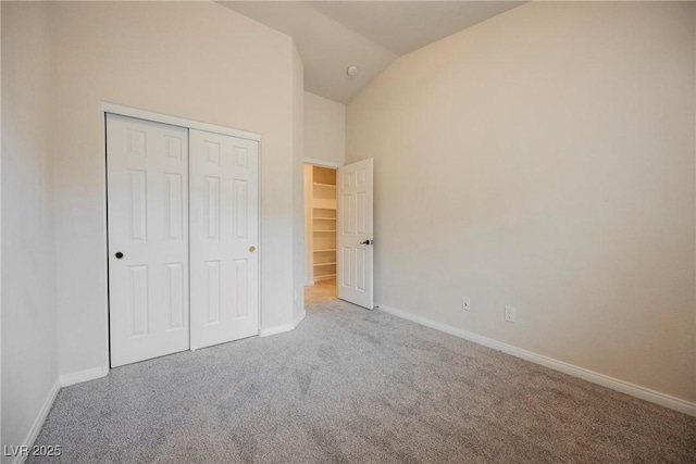 1598 Cowboy Chaps Pl, Henderson, NV 89002 - unfurnished bedroom with carpet flooring, a closet, and high vaulted ceiling