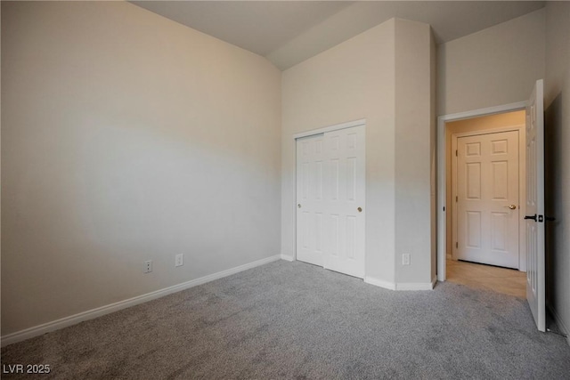 1598 Cowboy Chaps Pl, Henderson, NV 89002 - unfurnished bedroom with vaulted ceiling, carpet, and a closet