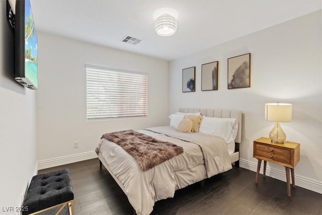 8325 Winterchase Pl, Las Vegas, NV 89143 - bedroom with dark wood-style flooring and baseboards