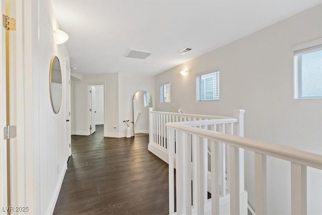 8325 Winterchase Pl, Las Vegas, NV 89143 - hallway with an upstairs landing and dark wood finished floors
