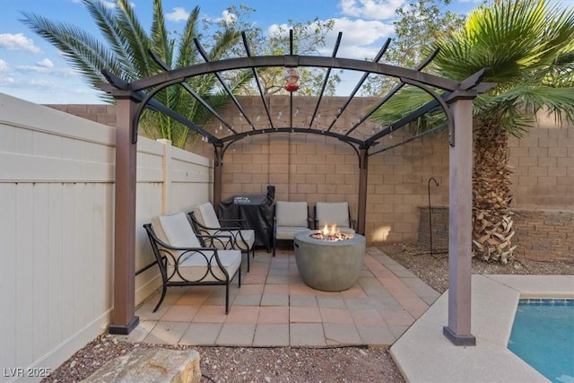 8325 Winterchase Pl, Las Vegas, NV 89143 - view of patio / terrace with an outdoor fire pit