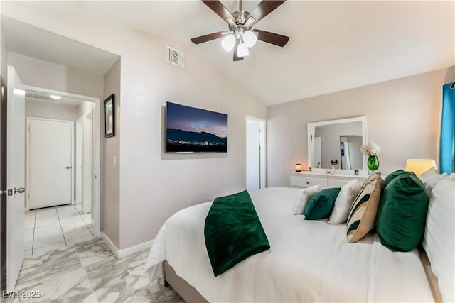 2093 Seahurst Dr, Las Vegas, NV 89142 - bedroom with lofted ceiling, light marble finish flooring, and ceiling fan